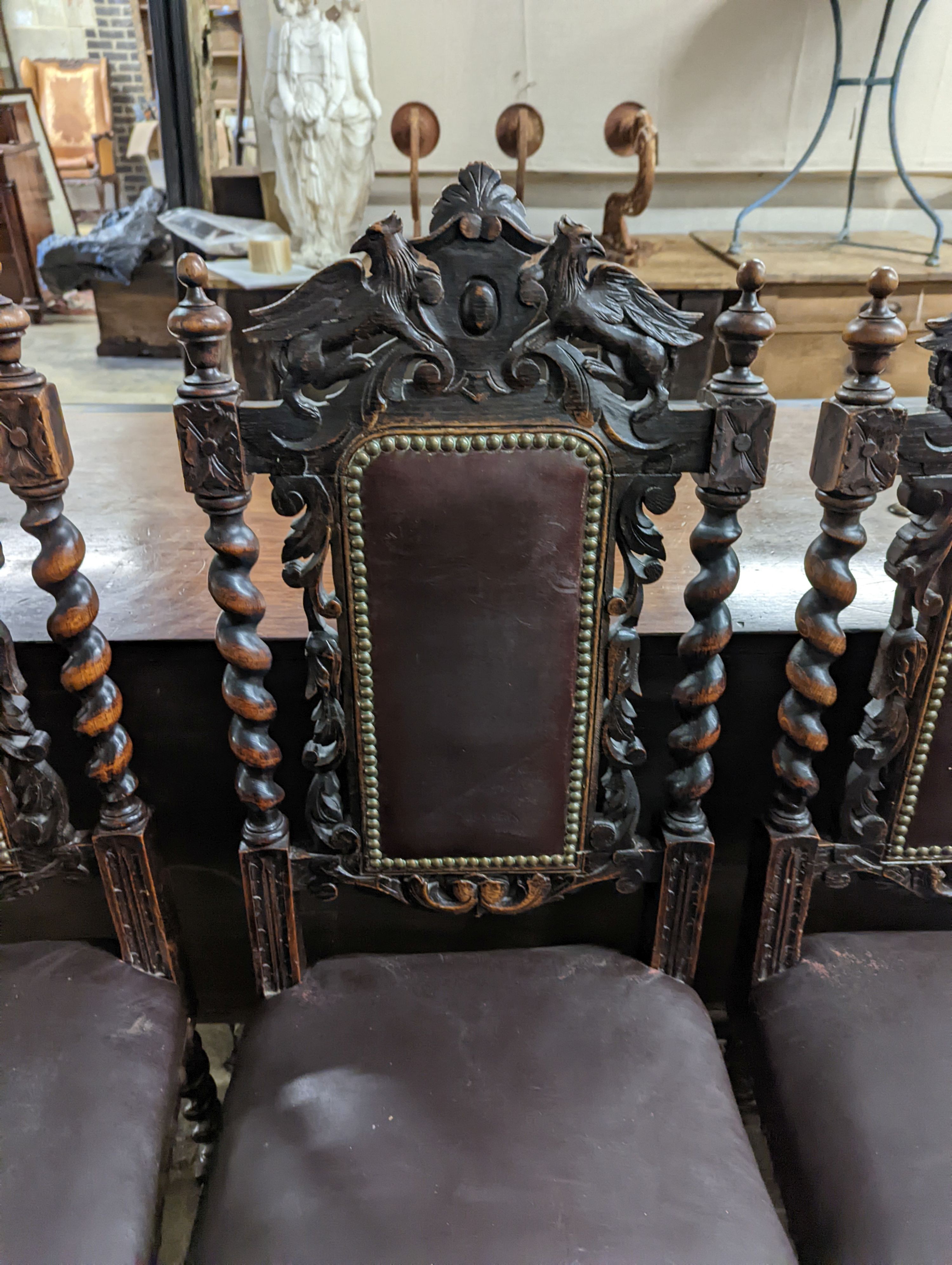 A set of four Flemish style oak Highback dining chairs (1 AF) H-113cm.